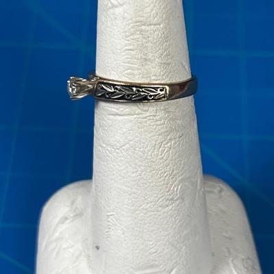 14 K Gold and Diamond Ring with Antique Leaf Etching on it