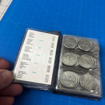 A Little Booklet with the 50 State Quarter Set Complete 