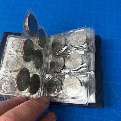 A Little Booklet with the 50 State Quarter Set Complete 