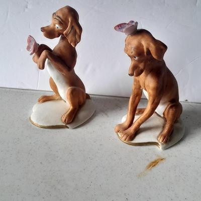 Two vintage hound dog with butterfly figures marked on base