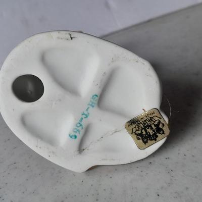 Two vintage hound dog with butterfly figures marked on base