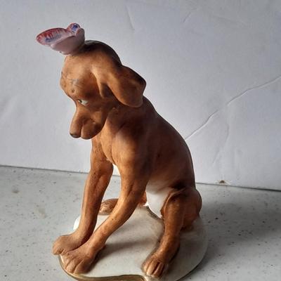 Two vintage hound dog with butterfly figures marked on base