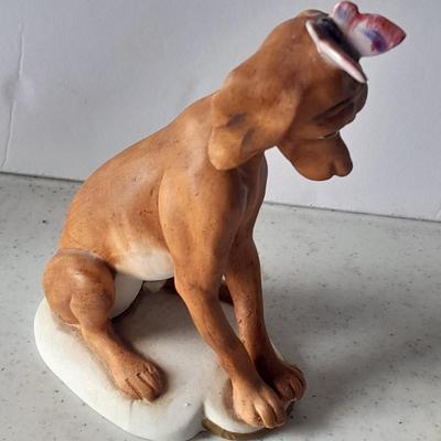 Two vintage hound dog with butterfly figures marked on base