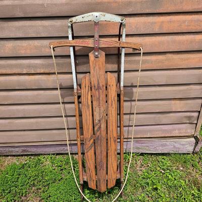 Two Vintage Sleds & Wheelbarrow  (OB3-JS)