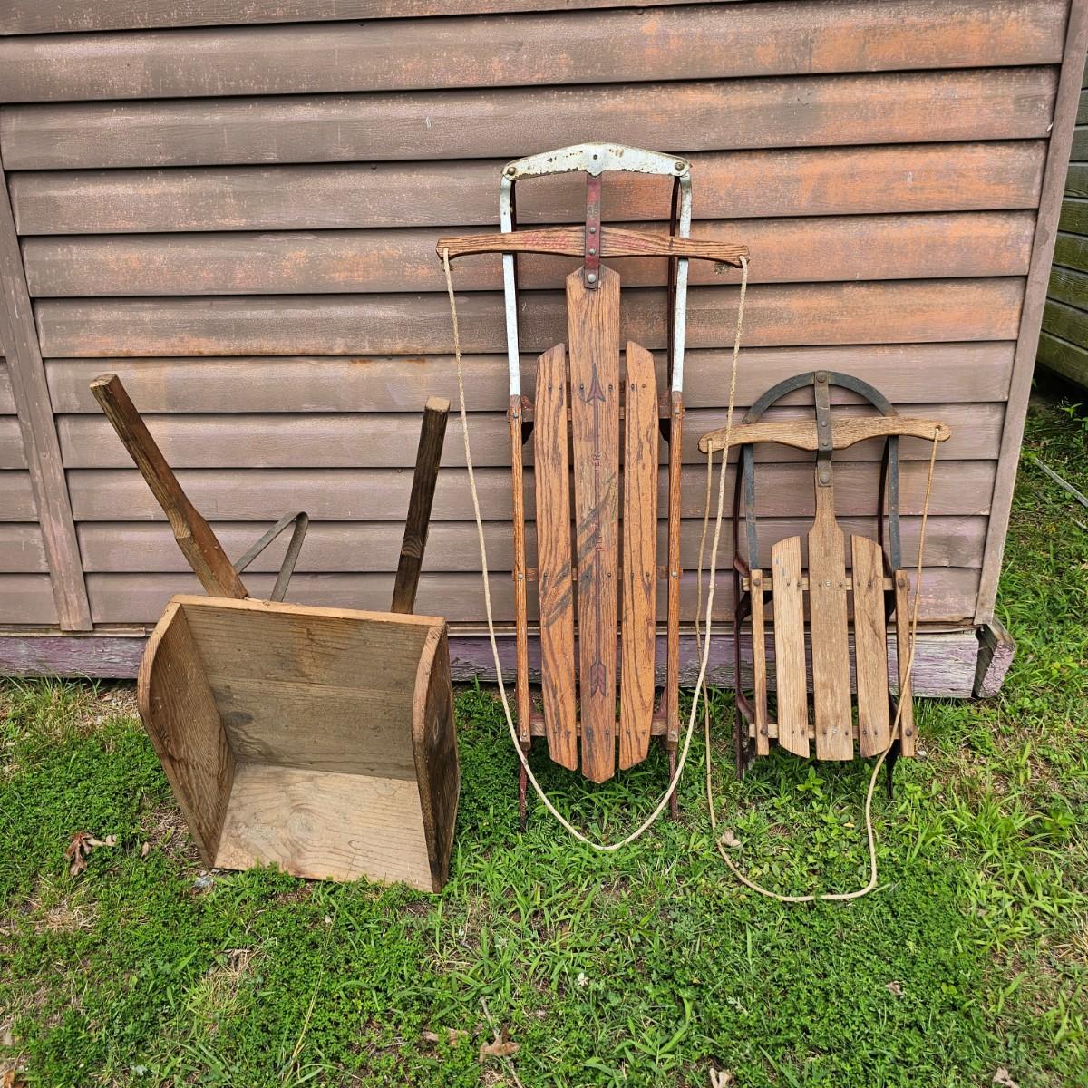 Two Vintage Sleds & Wheelbarrow (OB3-JS) | EstateSales.org