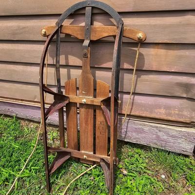 Two Vintage Sleds & Wheelbarrow  (OB3-JS)