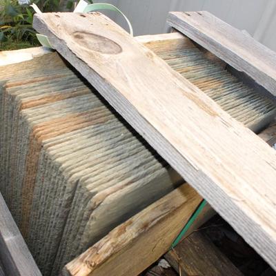 Natural Slate approx. 12 x 12 and total of 35. Est, $130 to $250.