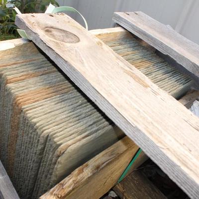 Natural Slate approx. 12 x 12 and total of 35. Est, $130 to $250.