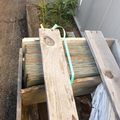 Natural Slate approx. 12 x 12 and total of 35. Est, $130 to $250.