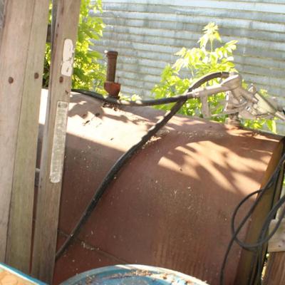 275 gallon oil tank set up for diesel with hand pump and hose. est. $200 to $350.