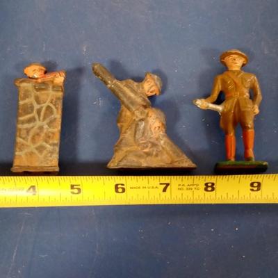 LOT 109 THREE METAL TOY SOLDIERS