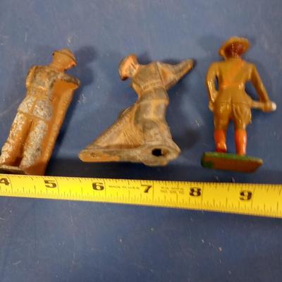 LOT 109 THREE METAL TOY SOLDIERS