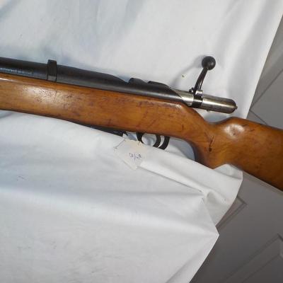 Sears and Roebuck 12 gauge / bolt action shot gun./est. $130 to $240.
