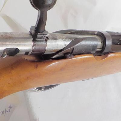 Sears and Roebuck 12 gauge / bolt action shot gun./est. $130 to $240.