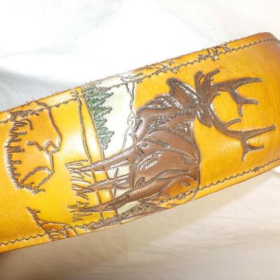 4 Adjustable leather rifle slings./ Est, $25 to $60.