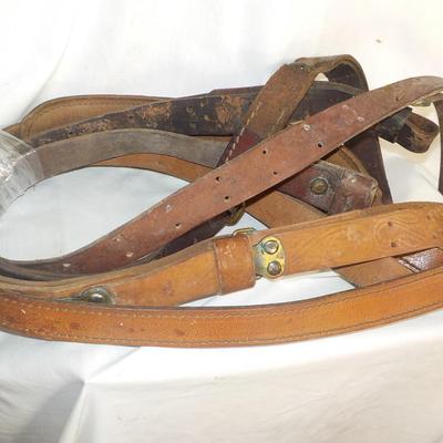 4 Adjustable leather rifle slings./ Est, $25 to $60.