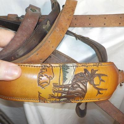 4 Adjustable leather rifle slings./ Est, $25 to $60.