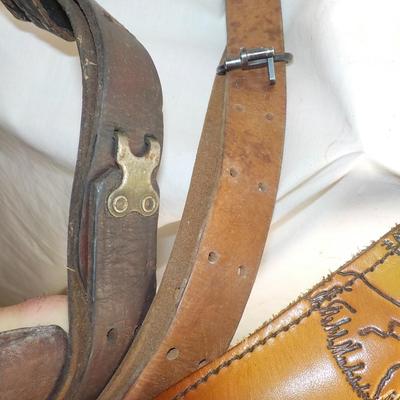 4 Adjustable leather rifle slings./ Est, $25 to $60.