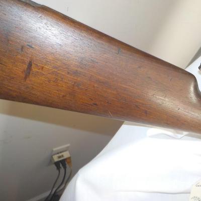 A Mauser 8mm rifle with manual sites. / est. $250 to $620.