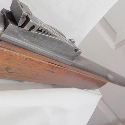 A Mauser 8mm rifle with manual sites. / est. $250 to $620.