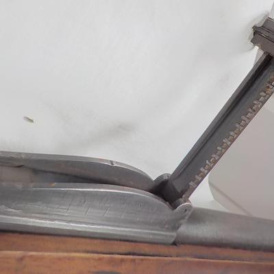 A Mauser 8mm rifle with manual sites. / est. $250 to $620.