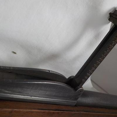 A Mauser 8mm rifle with manual sites. / est. $250 to $620.
