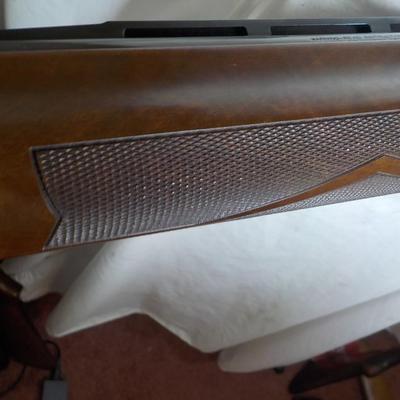 Famous Remington 11-87 Premiere Trap 12 gauge shot gun/ est $400 to $900.