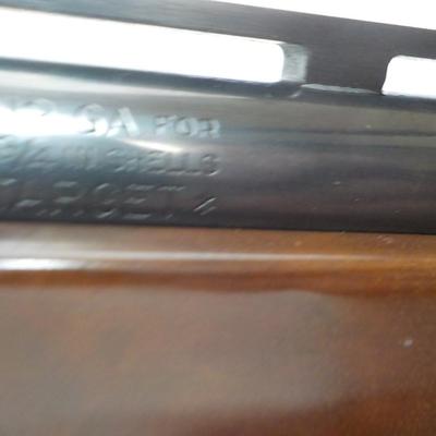 Famous Remington 11-87 Premiere Trap 12 gauge shot gun/ est $400 to $900.