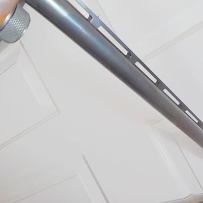Famous Remington 11-87 Premiere Trap 12 gauge shot gun/ est $400 to $900.