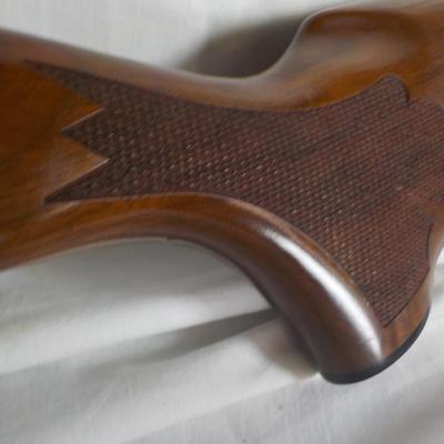 Famous Remington 11-87 Premiere Trap 12 gauge shot gun/ est $400 to $900.