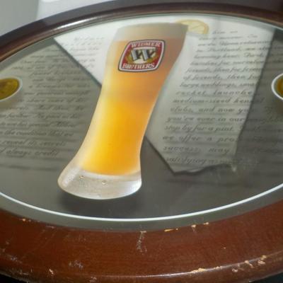 Beer sign Widmer Brothers Beer/ Oval mirror w/ writing. est. $20 to $40.