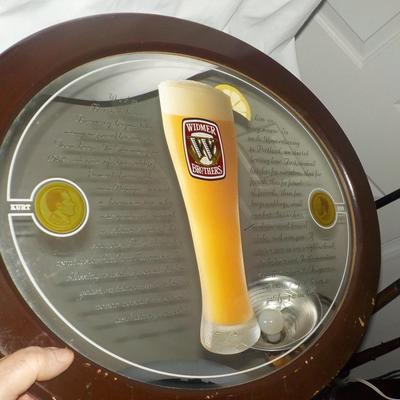 Beer sign Widmer Brothers Beer/ Oval mirror w/ writing. est. $20 to $40.