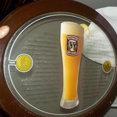 Beer sign Widmer Brothers Beer/ Oval mirror w/ writing. est. $20 to $40.