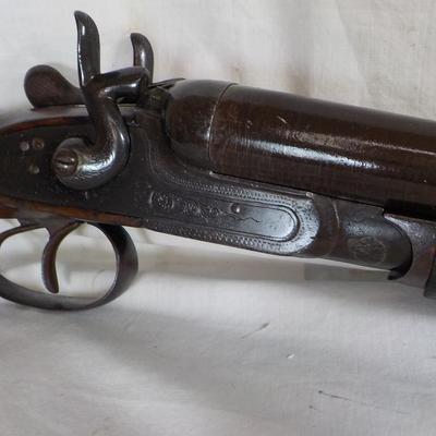 1880 double barrel shot gun, does fire regular shells. / est. $180 to $260.