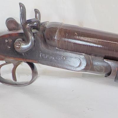 1880 double barrel shot gun, does fire regular shells. / est. $180 to $260.