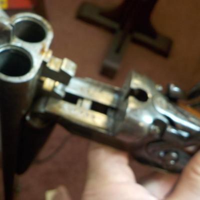 1880 double barrel shot gun, does fire regular shells. / est. $180 to $260.