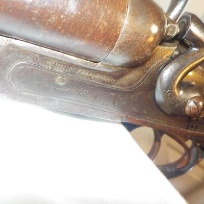 1880 double barrel shot gun, does fire regular shells. / est. $180 to $260.