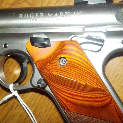 Ruger Mark 1V 22 cal. competition pistol./ $300 to $800.