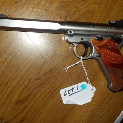 Ruger Mark 1V 22 cal. competition pistol./ $300 to $800.