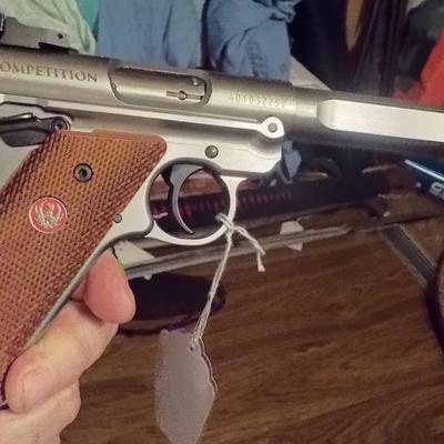 Ruger Mark 1V 22 cal. competition pistol./ $300 to $800.