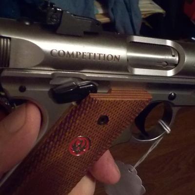 Ruger Mark 1V 22 cal. competition pistol./ $300 to $800.