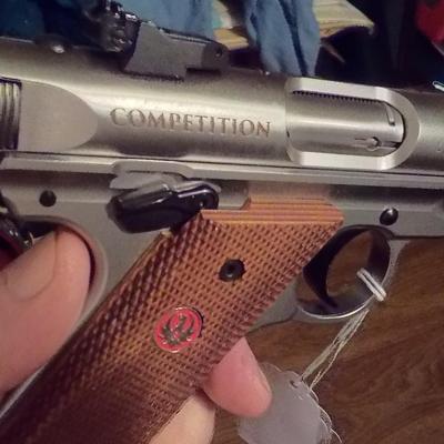 Ruger Mark 1V 22 cal. competition pistol./ $300 to $800.