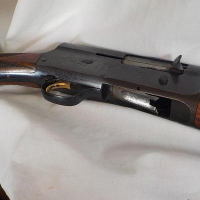 Browning 12 gauge lite shot gun, /est. $250 to $500.