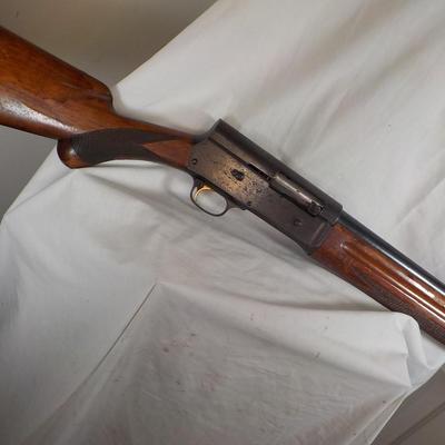 Browning 12 gauge lite shot gun, /est. $250 to $500.
