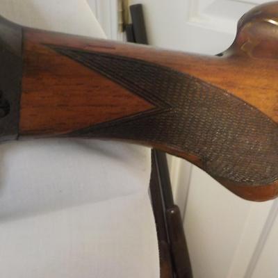 Browning 12 gauge lite shot gun, /est. $250 to $500.