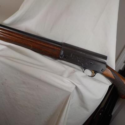 Browning 12 gauge lite shot gun, /est. $250 to $500.