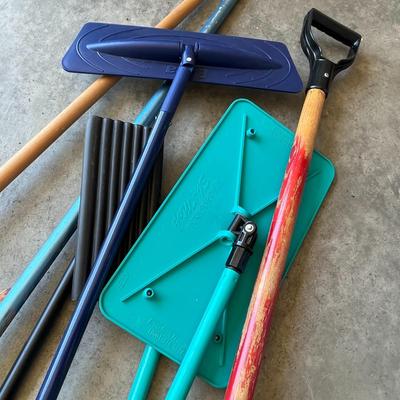 Various Brooms and Scoop Shovel