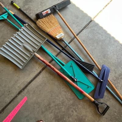 Various Brooms and Scoop Shovel