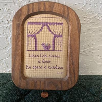 Stitched "When God closes a door, he opens a window"