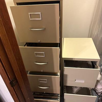 2 File Cabinets -Tall one W/ Key